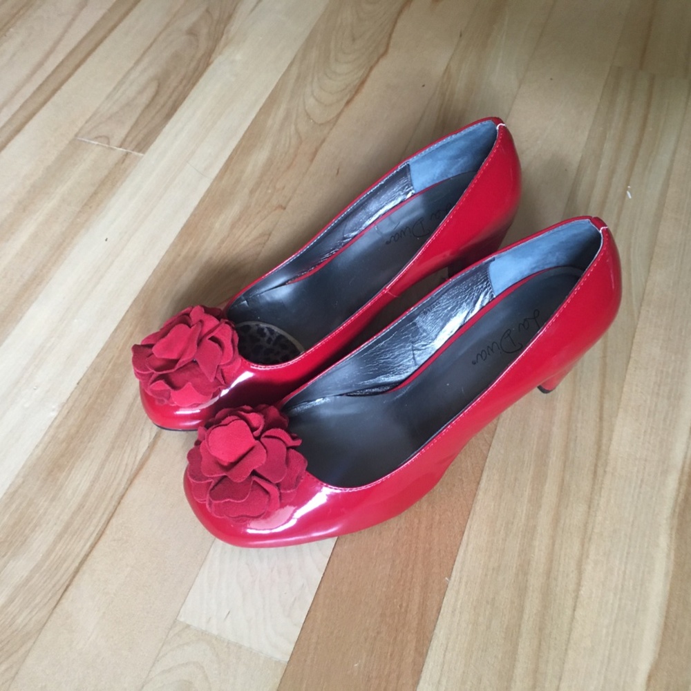 Red shinny heel shoes size 8.5